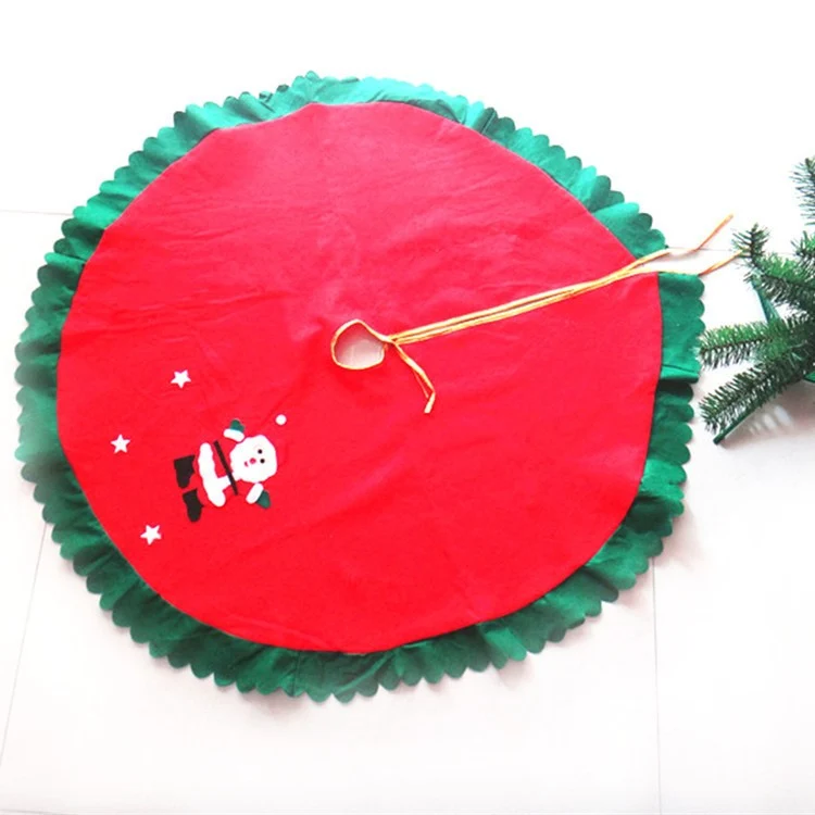 Karácsonyfa alátét, Vivimall, bolyhos anyagból, rögzítő szalagokkal, Mikulás mintás, piros/zöld, átmérő 90 cm